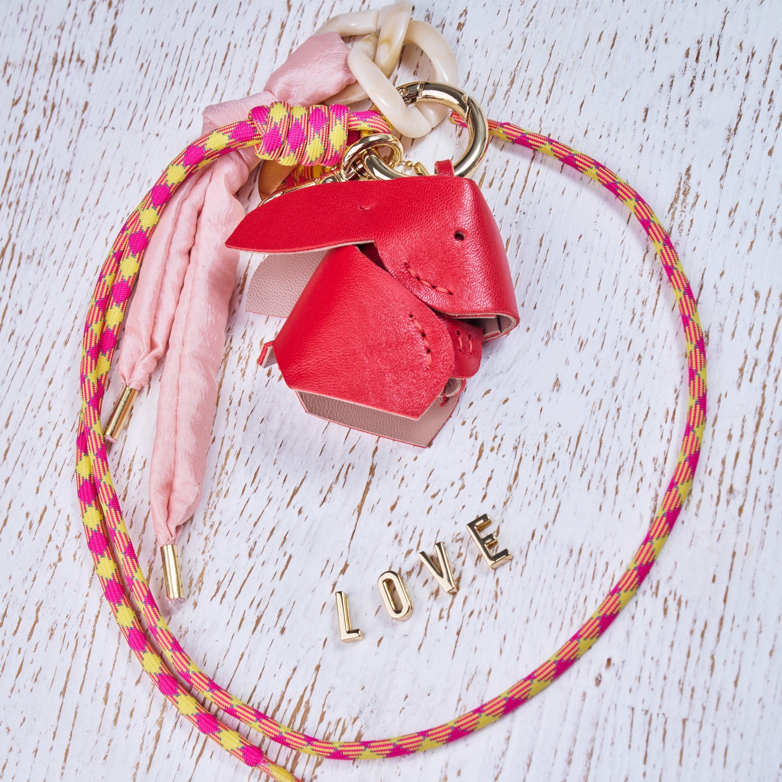 HAPPY BUNNY red bag charm